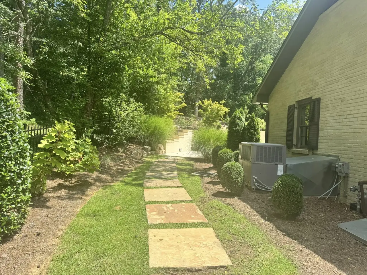 Stepping stones set in a side-yard path